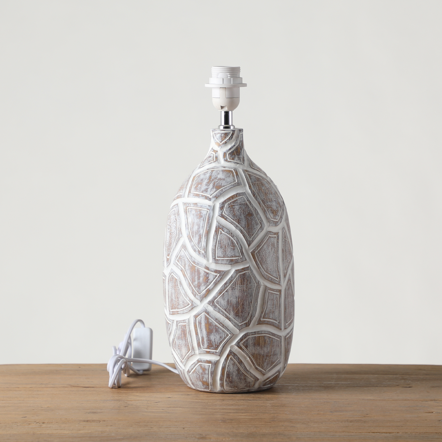 Rustic, organic, and bohemian-inspired design Textured, Carved Base, lamp