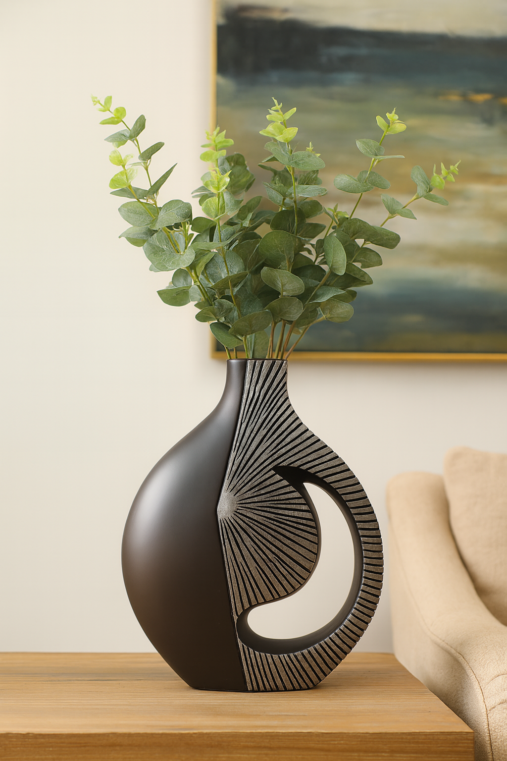 Modern sculptural, tribal-inspired,contemporary luxury,Asymmetrical, Openwork Design