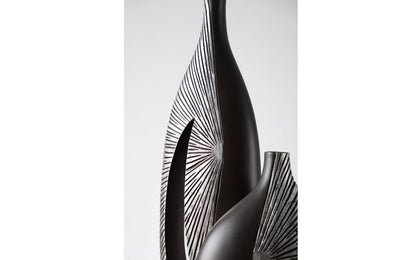 Modern sculptural, tribal-inspired, and contemporary luxury,Asymmetrical, Openwork Design