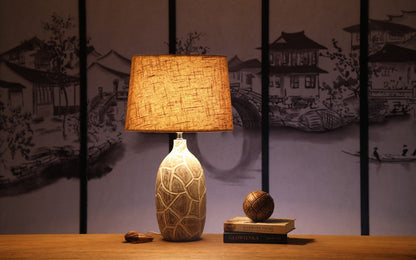 Rustic, organic, and bohemian-inspired design Textured, Carved Base, lamp