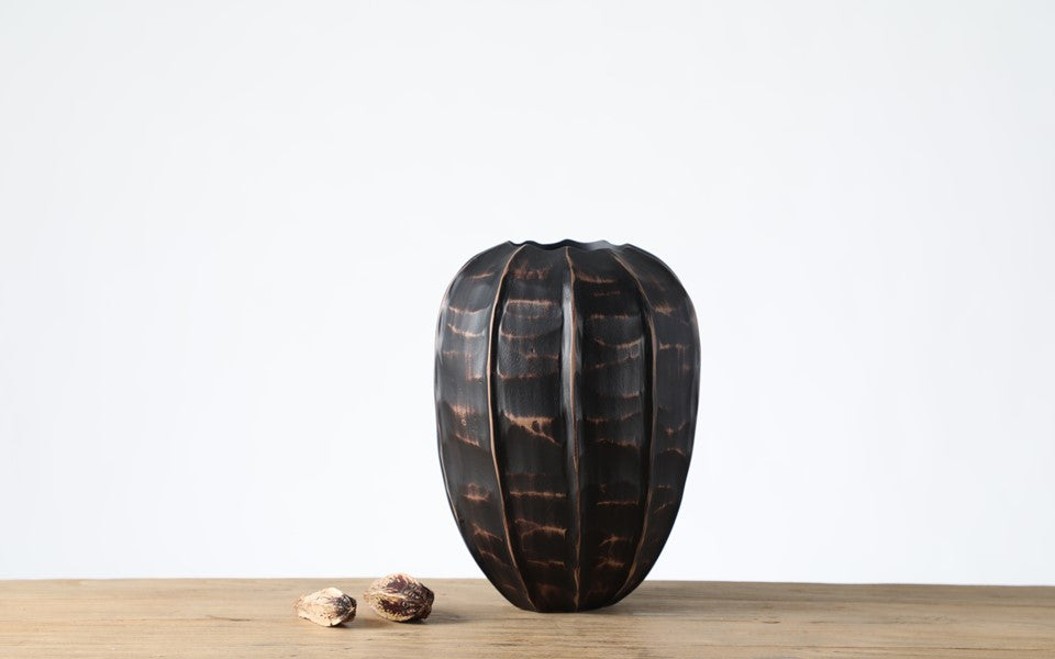 Rustic, tribal-inspired, and contemporary artisan,Organic, Rounded Shape with Vertical Grooves
