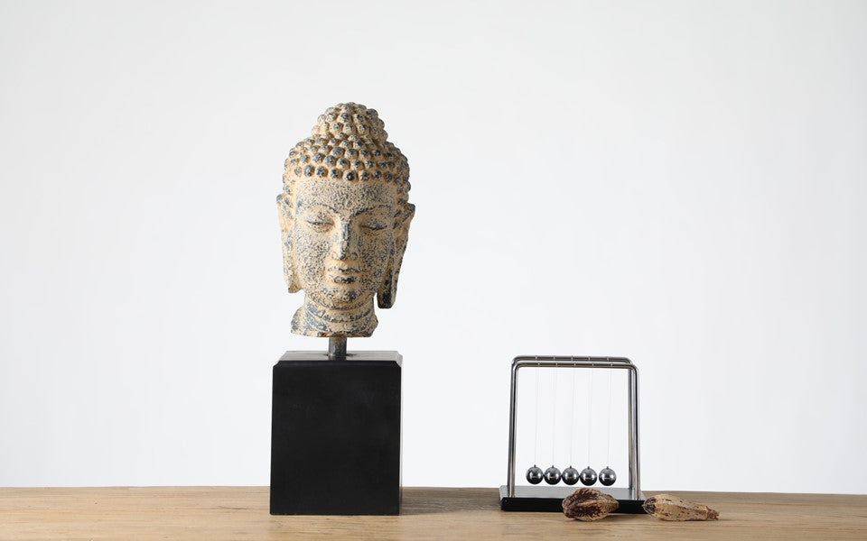 Buddha head sculpture on a stand, Zen, Asian-inspired, and Rustic décor styles,