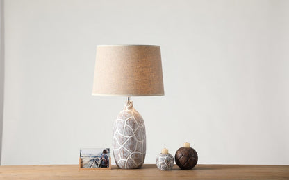 Rustic, organic, and bohemian-inspired design Textured, Carved Base, lamp