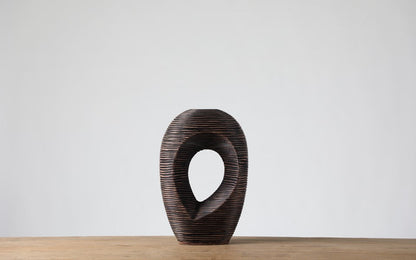 Modern sculptural, organic, and tribal-inspired,Abstract, Open-Circle Form, Vase