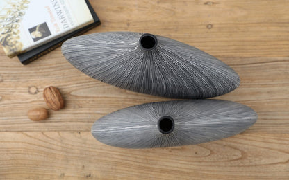 Modern organic, minimalist, and wabi-sabi-inspired, Sleek, Sculptural Forms, vase