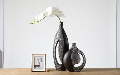 Modern sculptural, tribal-inspired, and contemporary luxury,Asymmetrical, Openwork Design