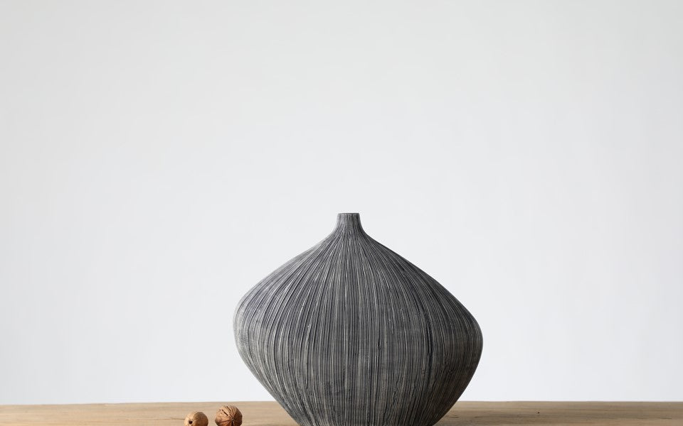 Modern organic, minimalist, and wabi-sabi-inspired, Sleek, Sculptural Forms, vase