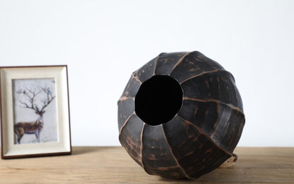 Rustic, tribal-inspired, and contemporary artisan,Organic, Rounded Shape with Vertical Grooves