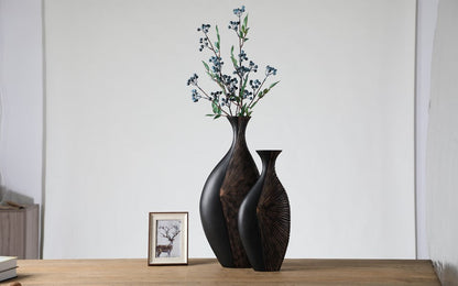 Modern tribal, sculptural, and contemporary luxury,Asymmetrical, Flowing Silhouettes, vase