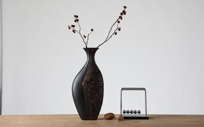 Modern tribal, sculptural, and contemporary luxury,Asymmetrical, Flowing Silhouettes, vase