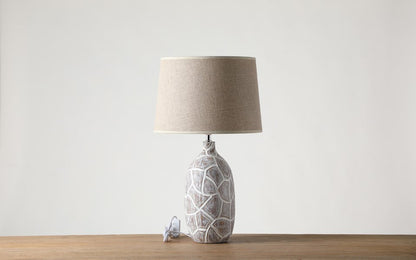 Rustic, organic, and bohemian-inspired design Textured, Carved Base, lamp