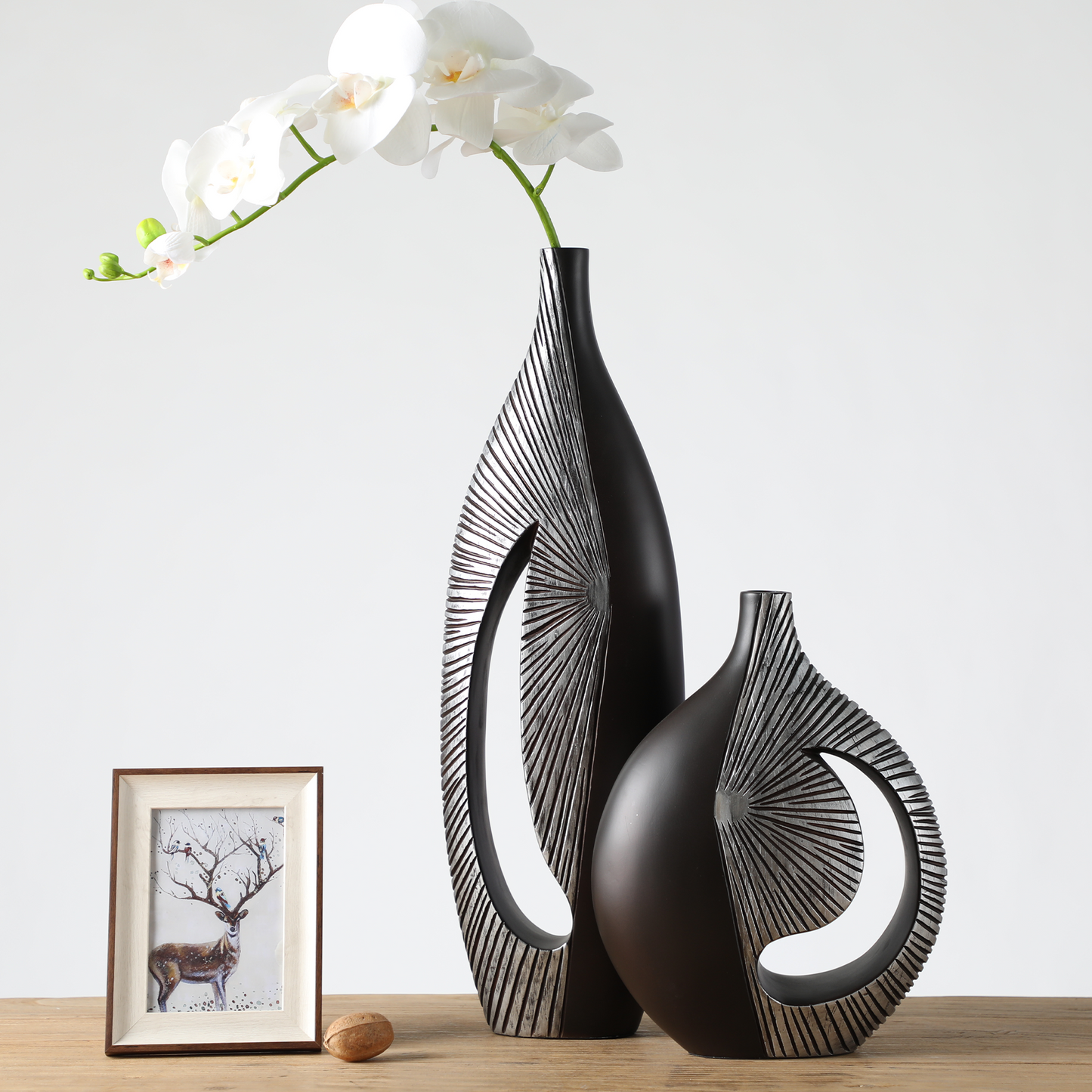 Modern sculptural, tribal-inspired,contemporary luxury,Asymmetrical, Openwork Design