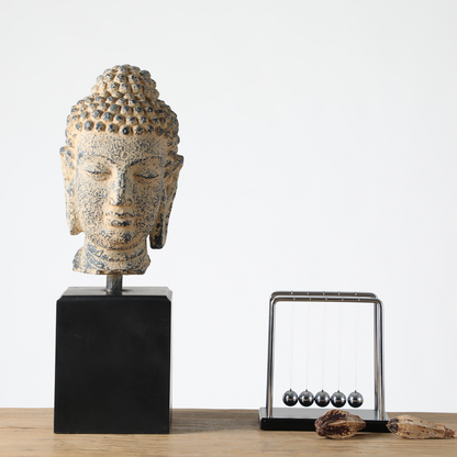 Buddha head sculpture on a stand, Zen, Asian-inspired, and Rustic décor styles,