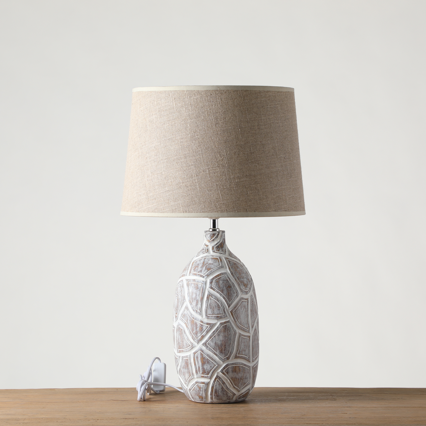 Rustic, organic, and bohemian-inspired design Textured, Carved Base, lamp