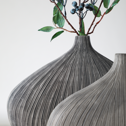 Modern organic, minimalist, and wabi-sabi-inspired, Sleek, Sculptural Forms, vase