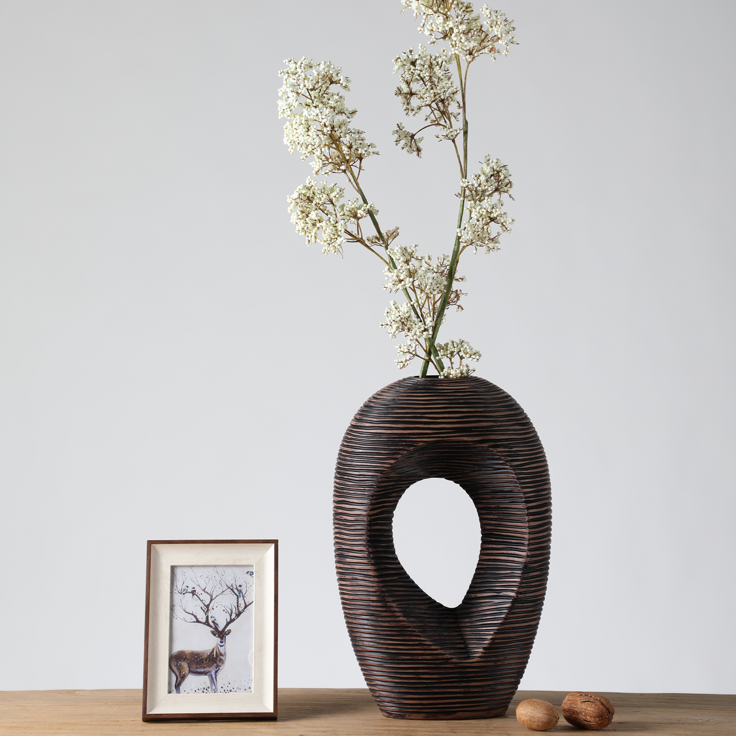 Modern sculptural, organic, and tribal-inspired,Abstract, Open-Circle Form, Vase