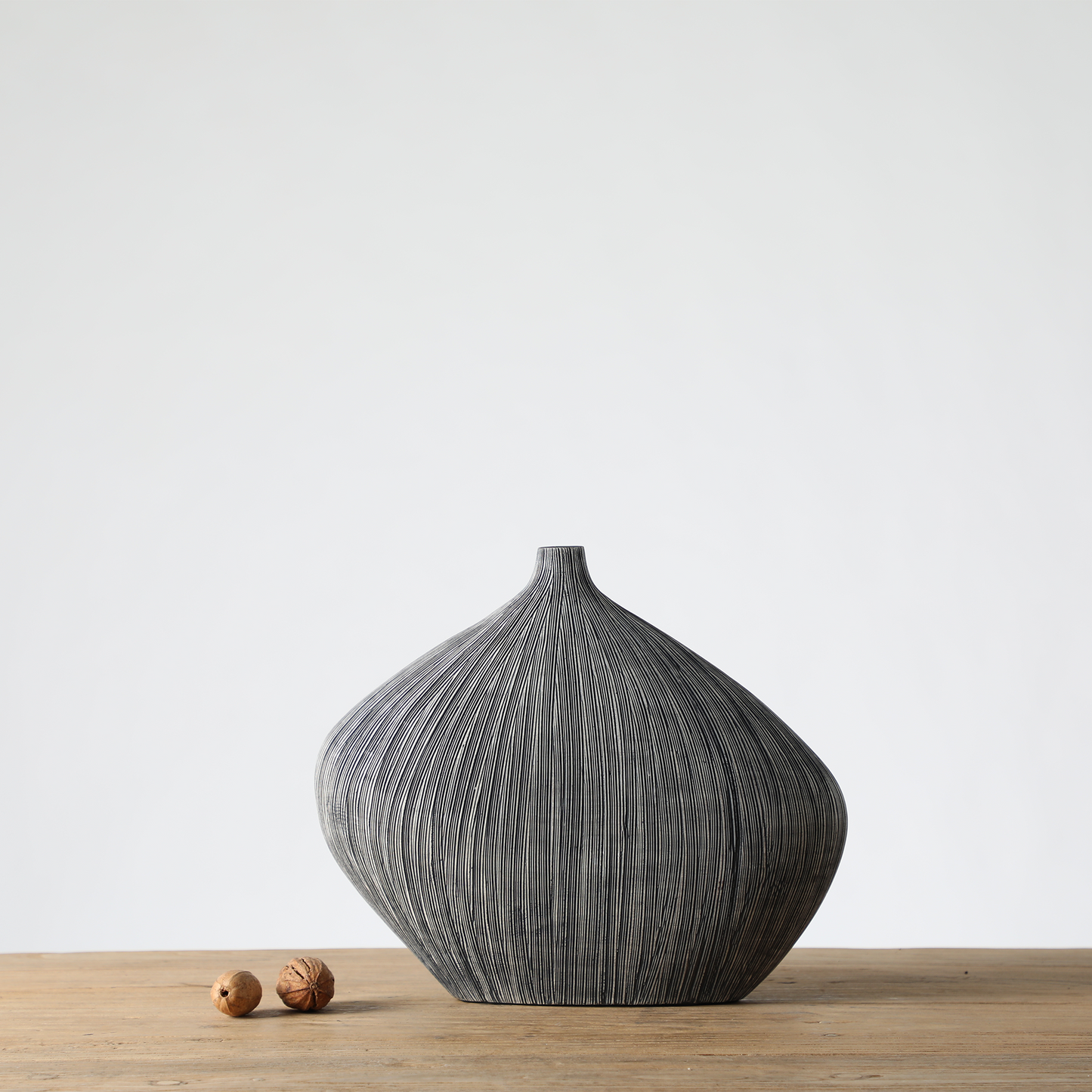 Modern organic, minimalist, and wabi-sabi-inspired, Sleek, Sculptural Forms, vase