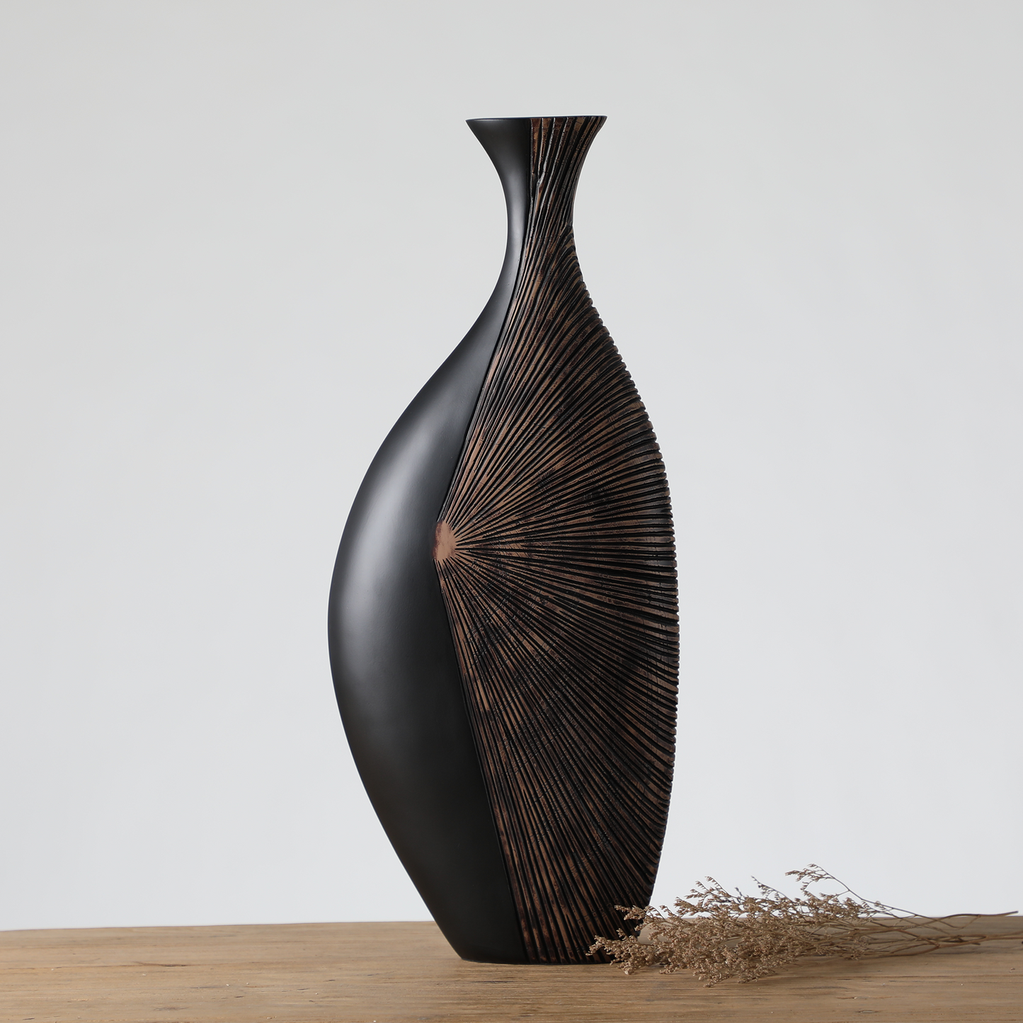 Modern tribal, sculptural, and contemporary luxury,Asymmetrical, Flowing Silhouettes, vase