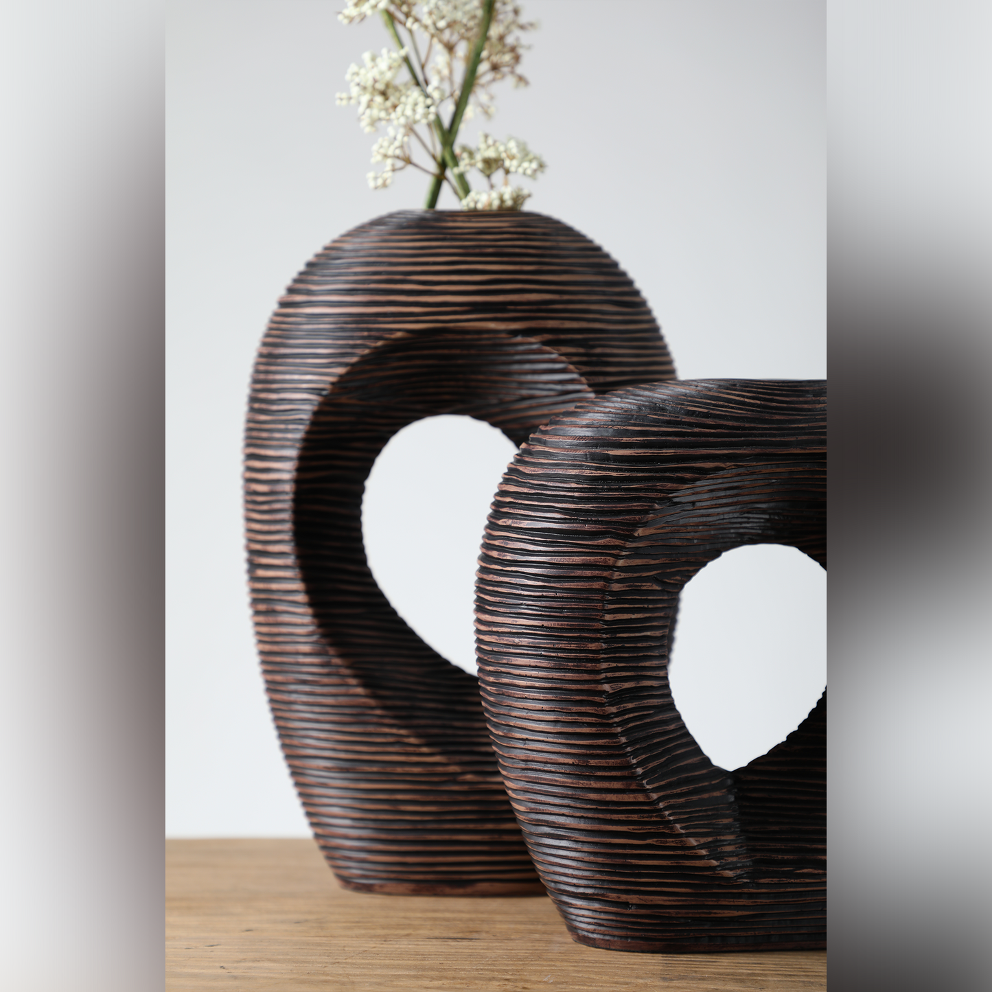 Modern sculptural, organic, and tribal-inspired,Abstract, Open-Circle Form, Vase