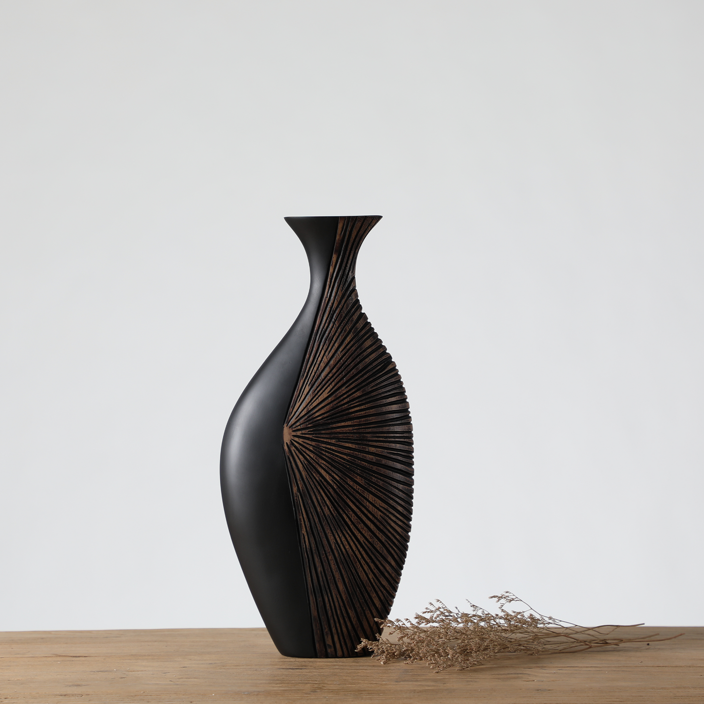 Modern tribal, sculptural, and contemporary luxury,Asymmetrical, Flowing Silhouettes, vase
