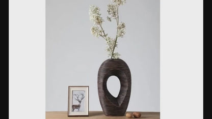 Modern sculptural, organic, and tribal-inspired,Abstract, Open-Circle Form, Vase